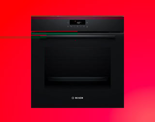 Een oven op een rode achtergrond