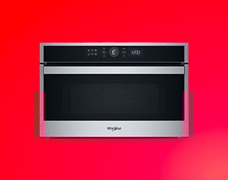 Een microgolfoven op een rode achtergrond