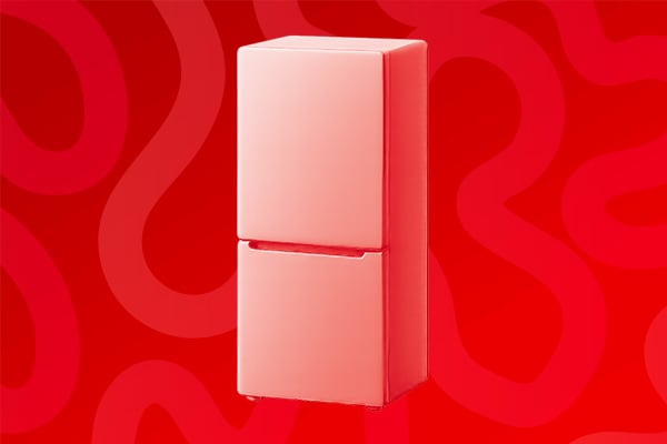 Un frigo avec conglateur sur un fond rouge