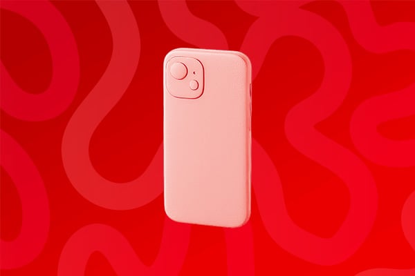 Un smartphone sur un fond rouge