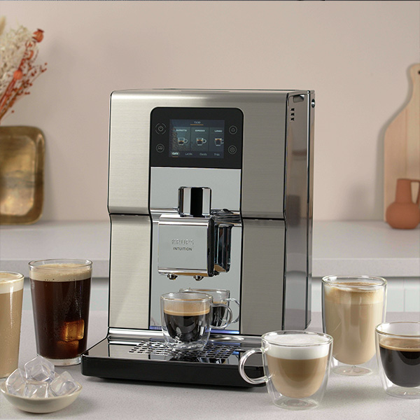 Une machine  caf Krups Intuition Experience + avec cinq types de caf quelle peut prparer 
